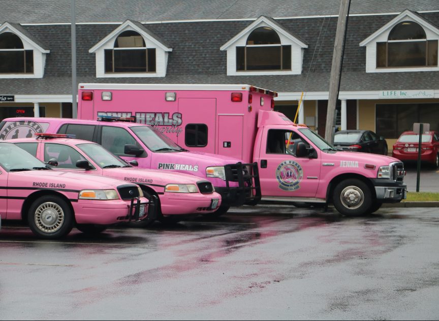 Pink Heals ambulance SUV and police cars